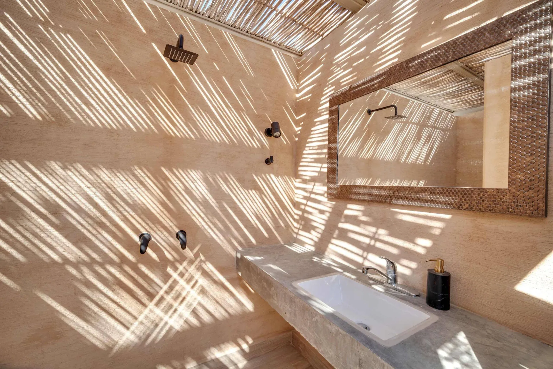 Outdoor shower on the private rooftop at Eagles Nest Cabo